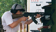 Mongo firing an AK-47.jpg